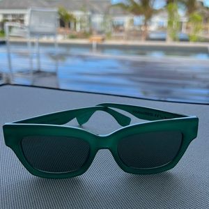 Emerald green Solid & Striped x Le Specs sunglasses.